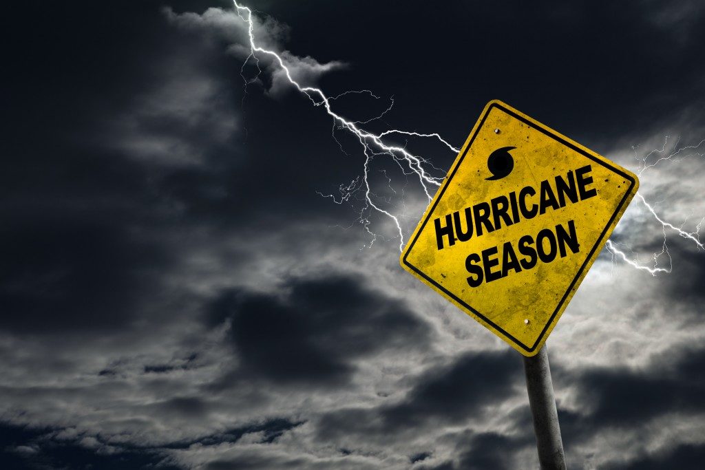 hurricane season sign with thunderstorm