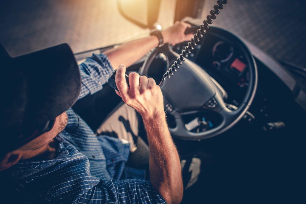man talking on the radio in the truck
