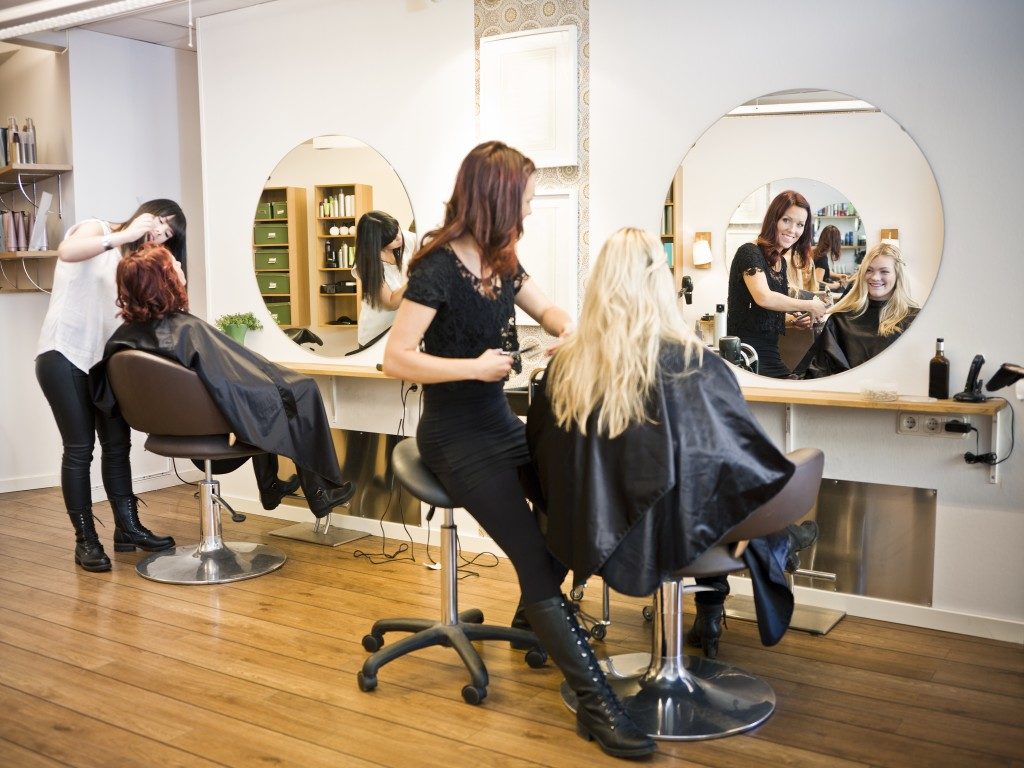 women getting their hair done at the salon