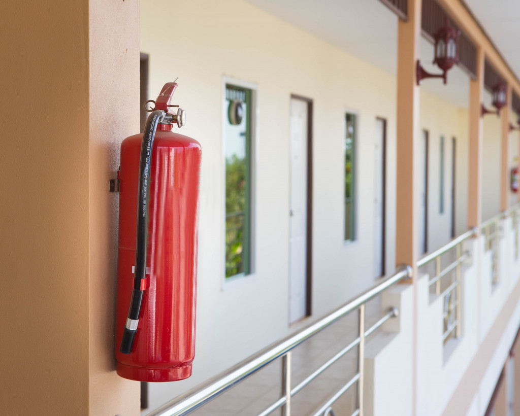 fire extinguisher placed well on a wall of a building complex